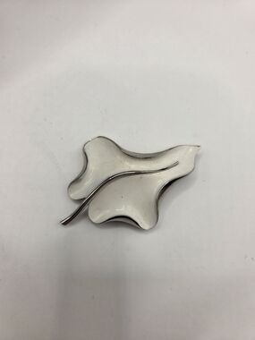 1701.  White Enamel Leaf Brooch with Silver Tone Trim